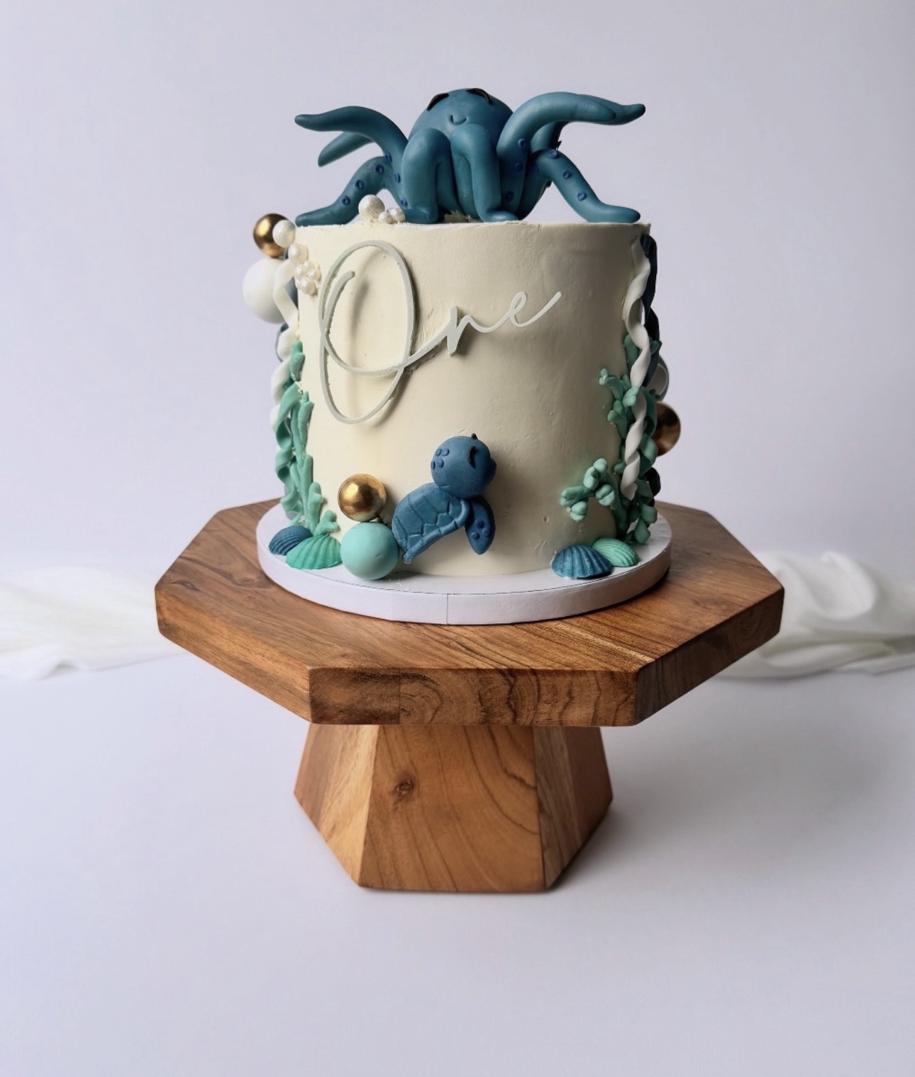 Under the sea octopus first birthday cake